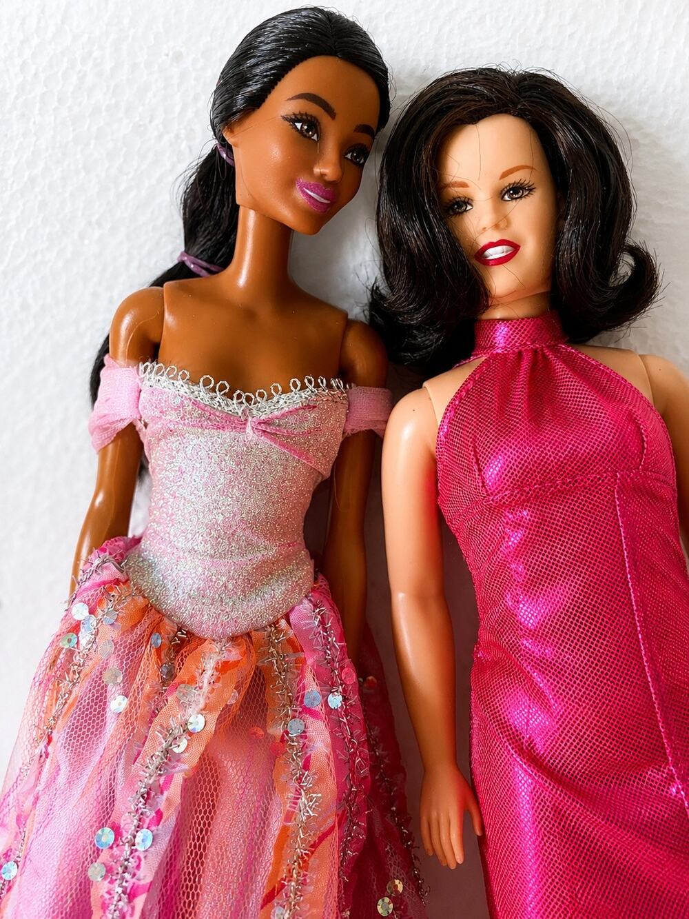 two Barbie dolls, including one appears to resemble a celebrity likeness doll
